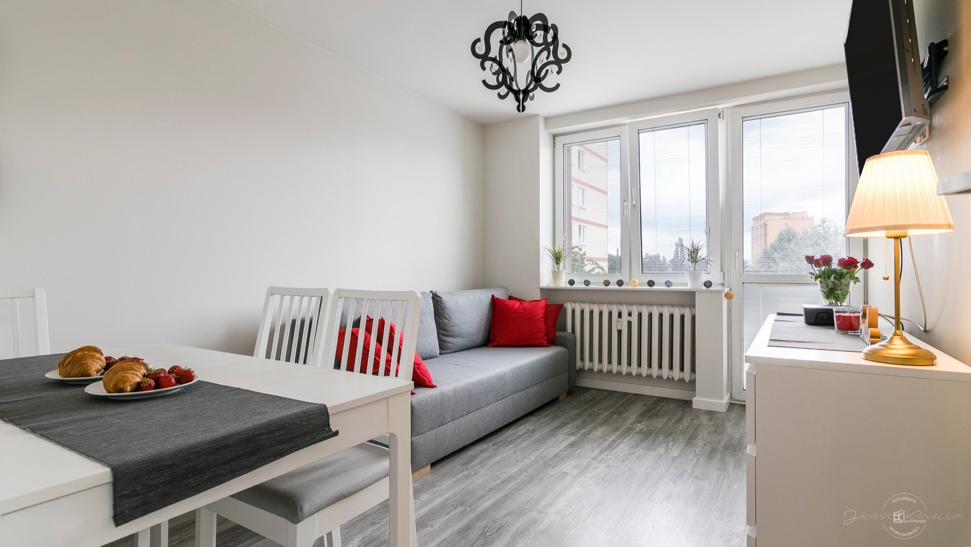 Szopy apartment in Śródmieście Gdańsk with bright white and grey interior